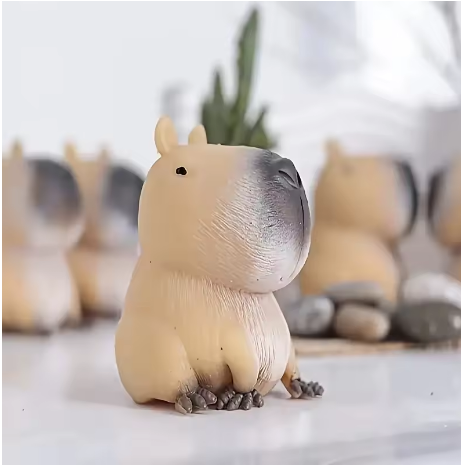 Beige capybara squishy with a grey snout