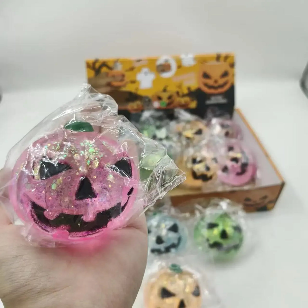 Sparkly pumpkin face squishy