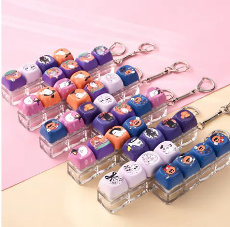 Keyboard fidget keychains with colorful Halloween designs