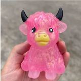 Pink glitter Highland cow squishy with black horns